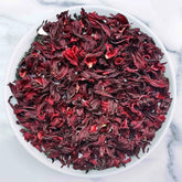 Hibiscus Tea with vibrant ruby red herbal infusion made from dried hibiscus flowers by Johns Ceylon Tea UK
