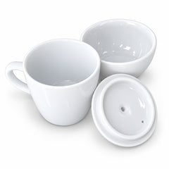 A white ceramic mug with a handle, shown alongside a matching white lid and an empty white bowl on a clean white background.