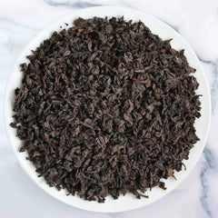 Premium Luxurious Ceylon Pekoe Tea loose-leaf black tea from Sri Lanka with bright golden amber infusion by Johns Ceylon Tea UK