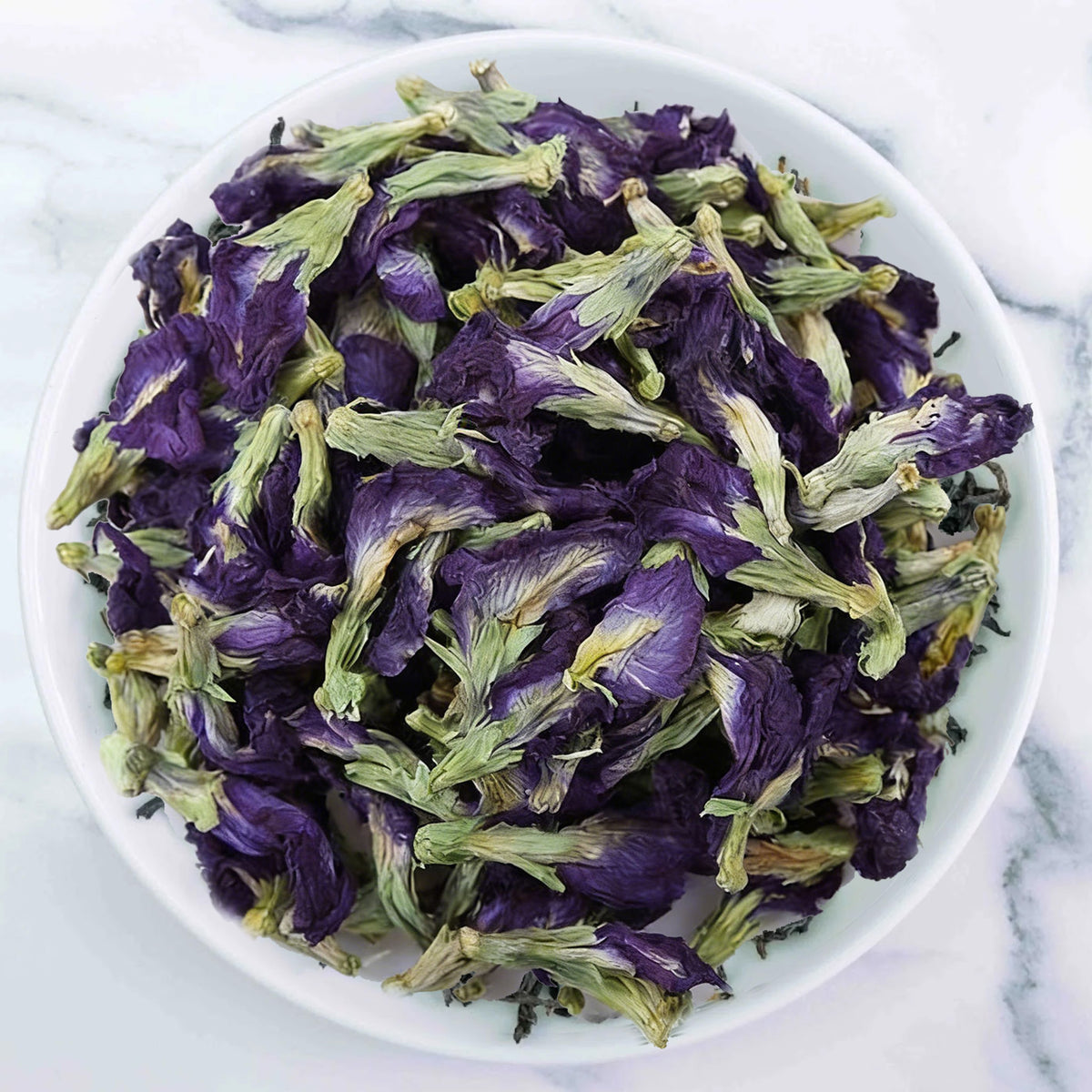Blue Butterfly Tea made from Butterfly Pea Flowers with vibrant blue herbal infusion by Johns Ceylon Tea UK